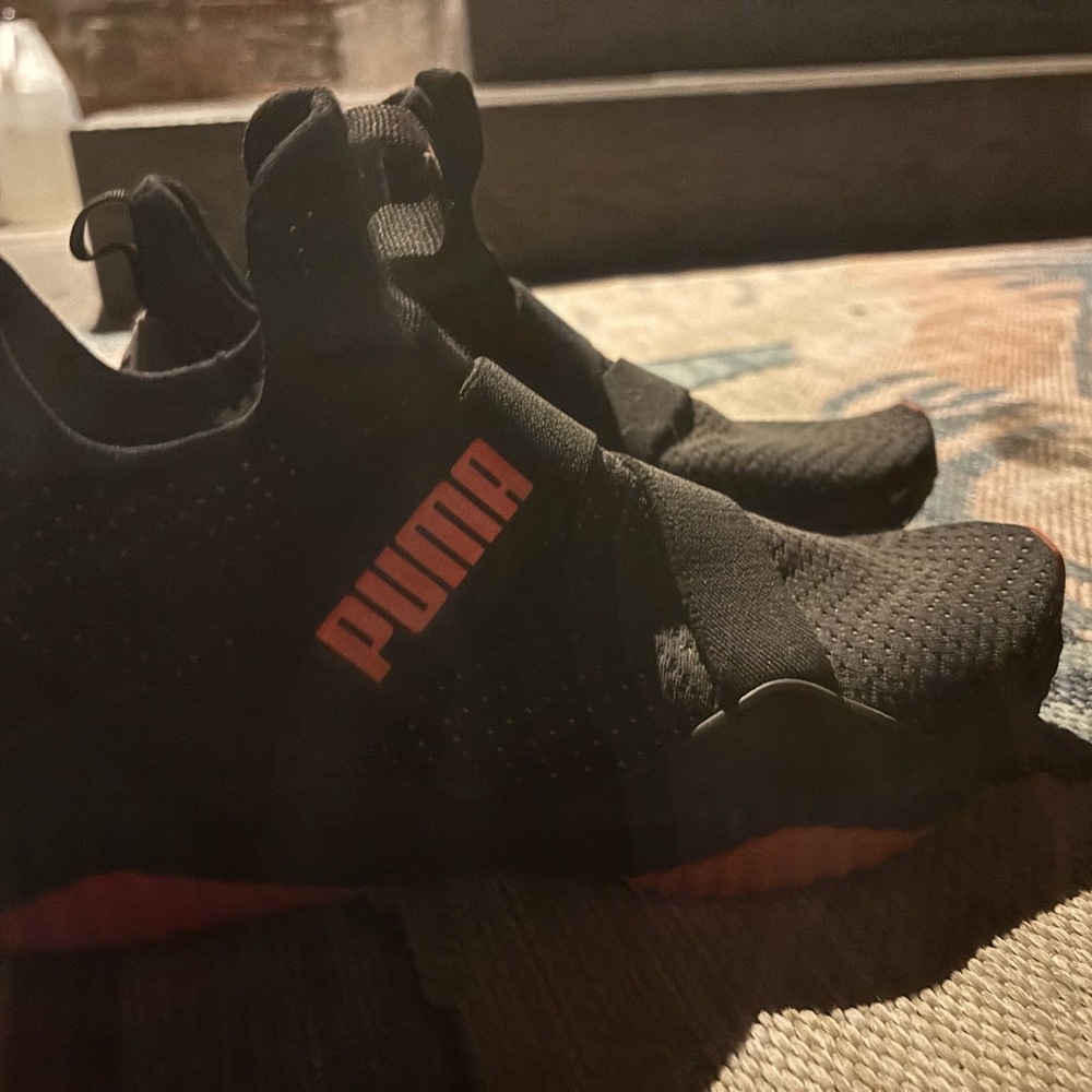 Puma Black Athletic Shoes with Pink Highlights